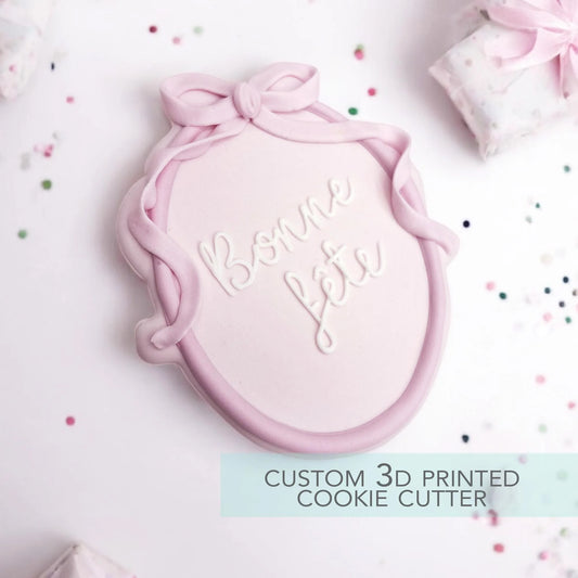 SkiCoquette Oval Plaque with Bow Cookie Cutter - Birthday Party Cookie Cutter 3.5"